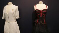 Dresses worn by U.S. tennis player Venus Williams in 2010 are displayed during an exhibition Game, Set, and Fashion at the Tennis museum of the Roland Garros Stadium, in Paris, Friday. (AP / Christophe Ena)