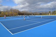 Students in Maureen Cyr's physical education class have been taking advance of the nice weather and playing on the new tennis courts this fall at Mt. Blue Campus.