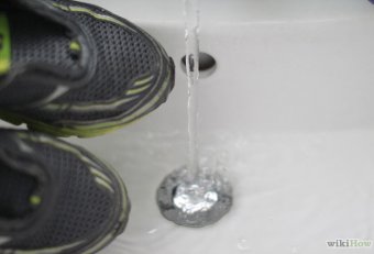 Clean wet tennis shoes